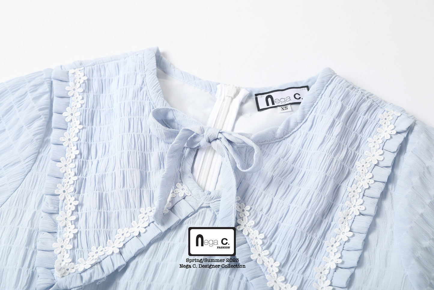 Nega C. เดรสคอวีอัดพลีทเอวผีเสื้อ | สีพาวเดอร์บลู | มีซับใน