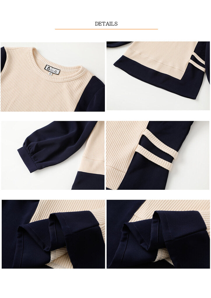 Nega C. เสื้อพัฟเย็บปะติดปะต่อคอกลม | สีน้ำเงินเข้ม | ยืดเล็กน้อย | ไม่มีซับใน