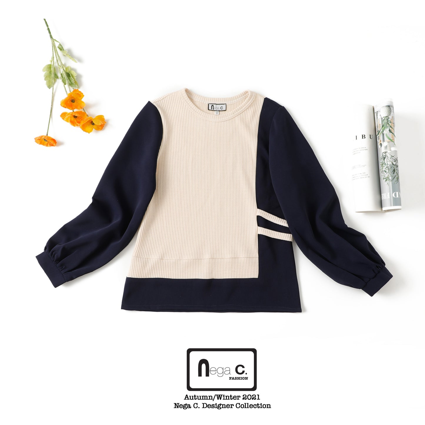 Nega C. เสื้อพัฟเย็บปะติดปะต่อคอกลม | สีน้ำเงินเข้ม | ยืดเล็กน้อย | ไม่มีซับใน