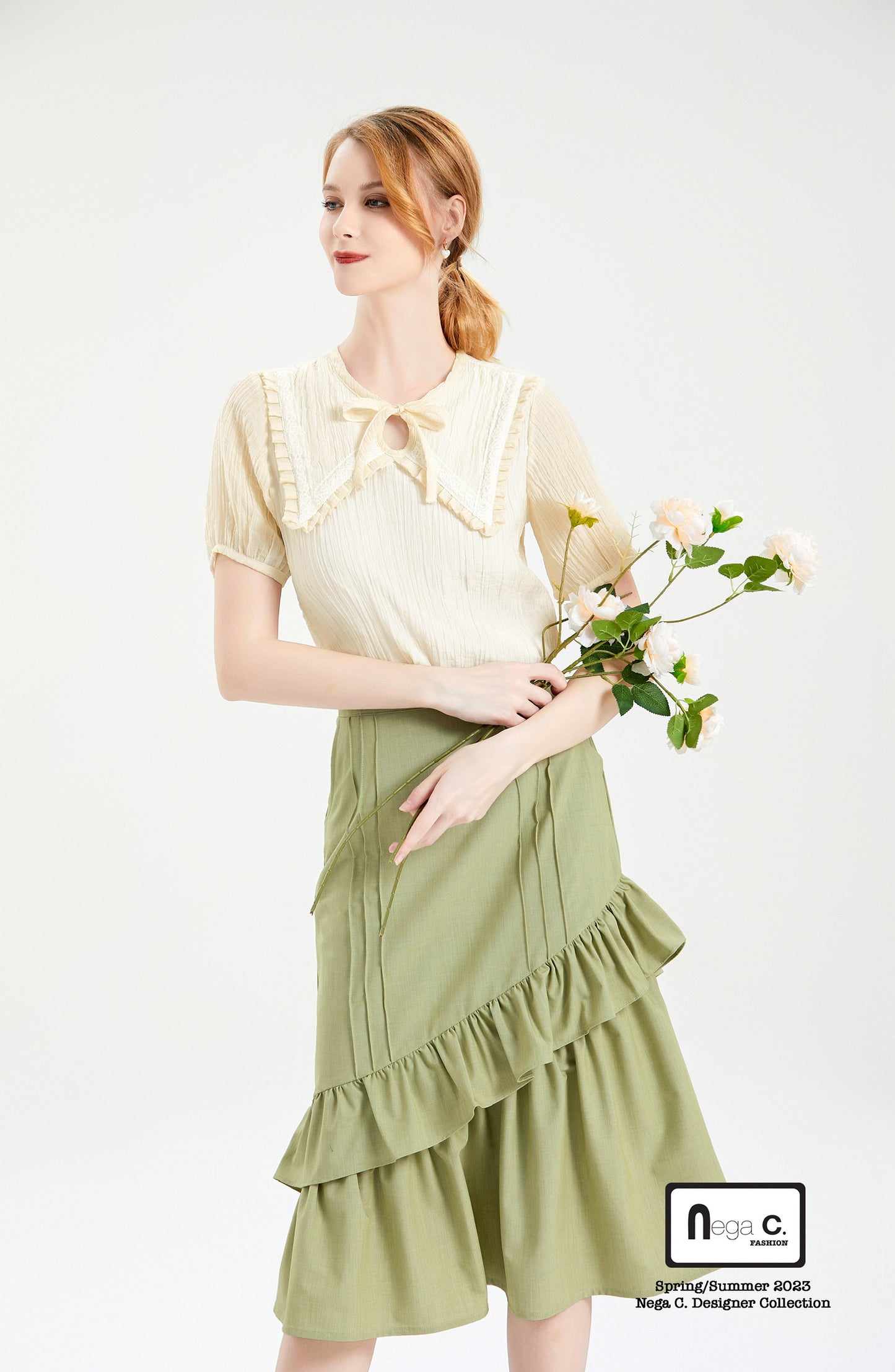 Nega C.เสื้อลูกไม้คอกลมจับจีบติดโบว์ผีเสื้อ|สีเบจ|มีซับใน