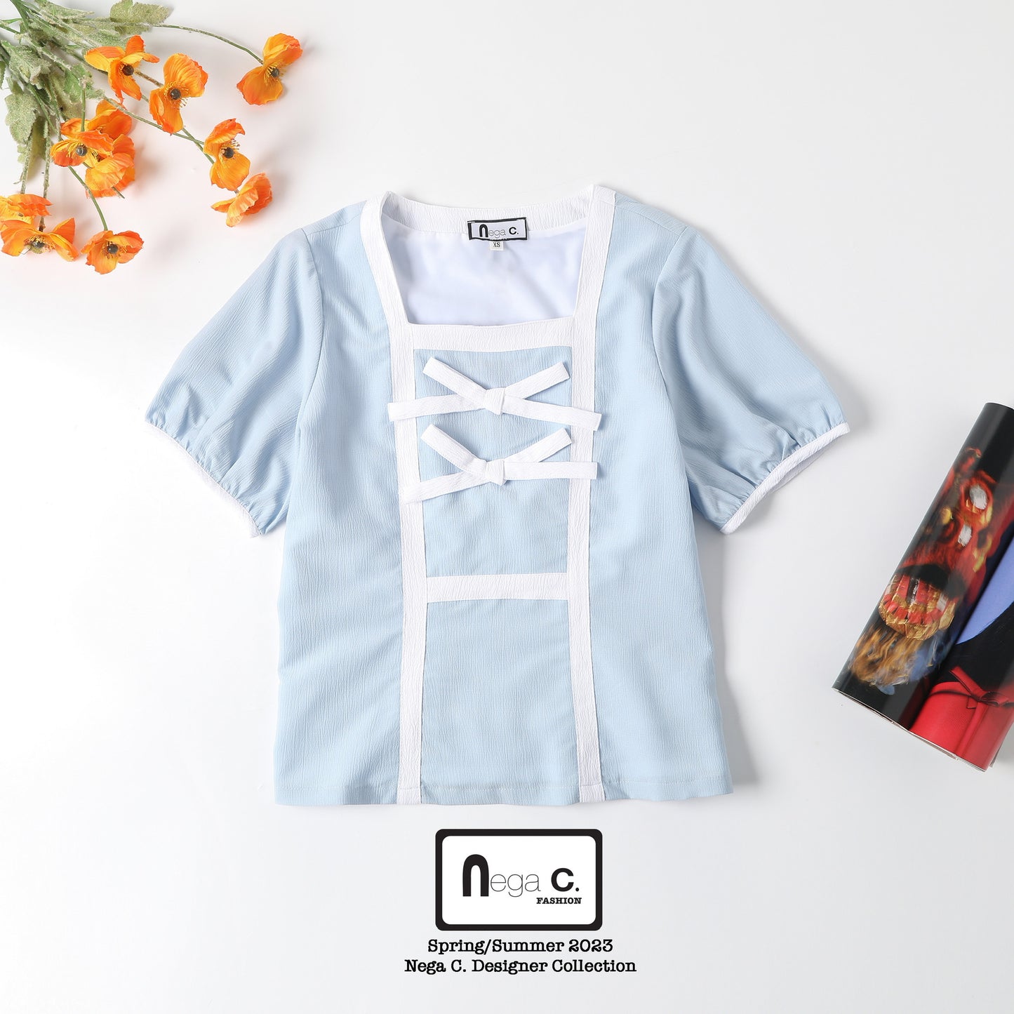 Nega C.เสื้อคอเหลี่ยมคัลเลอร์บล็อคแต่งโบว์คู่ |สีฟ้า |มีซับใน